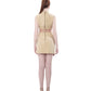 Back view of FlyandFall's structured mini skirt and sleeveless top, with center zip and soft shaping.