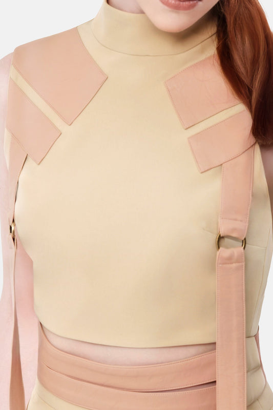 FlyandFall beige top detail showing modern structured panels and clean craftsmanship in neutral beige tone.
