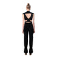 Back view of FlyandFall black cutout crop top with open back and high-waisted pants