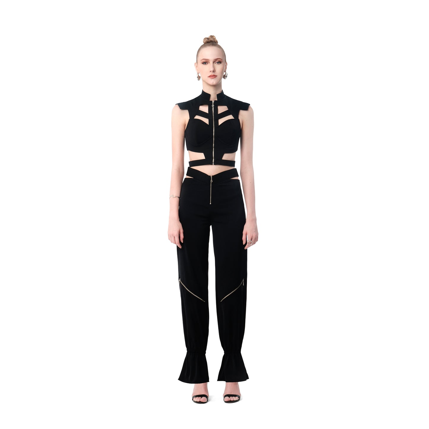 Front view of FlyandFall black cutout crop top and pants set, futuristic structured design