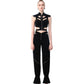 Model in FlyandFall’s black cutout crop top and high-waisted pants, styled with a sleek, sculptural silhouette.