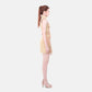 FlyandFall beige mini dress side view, structured silhouette with adjustable straps and clean futuristic lines.