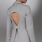 KAEL gray deconstructed suit blazer from the back showing the large geometric cutout and button closure