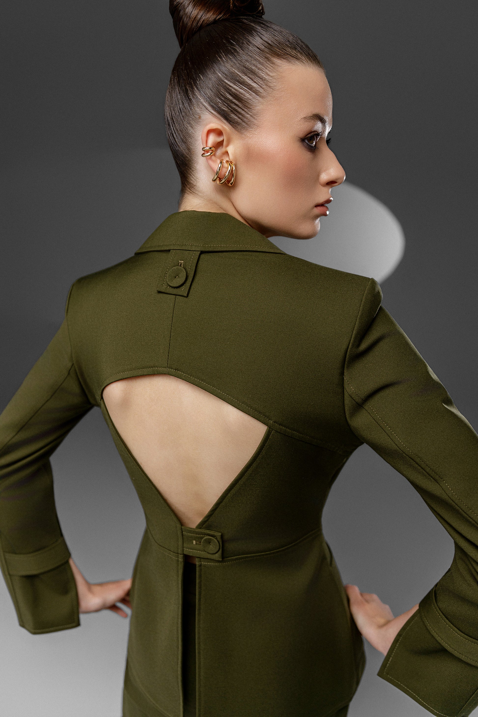 KAEL Military Green deconstructed cutout suit set featuring sculptural open back detail