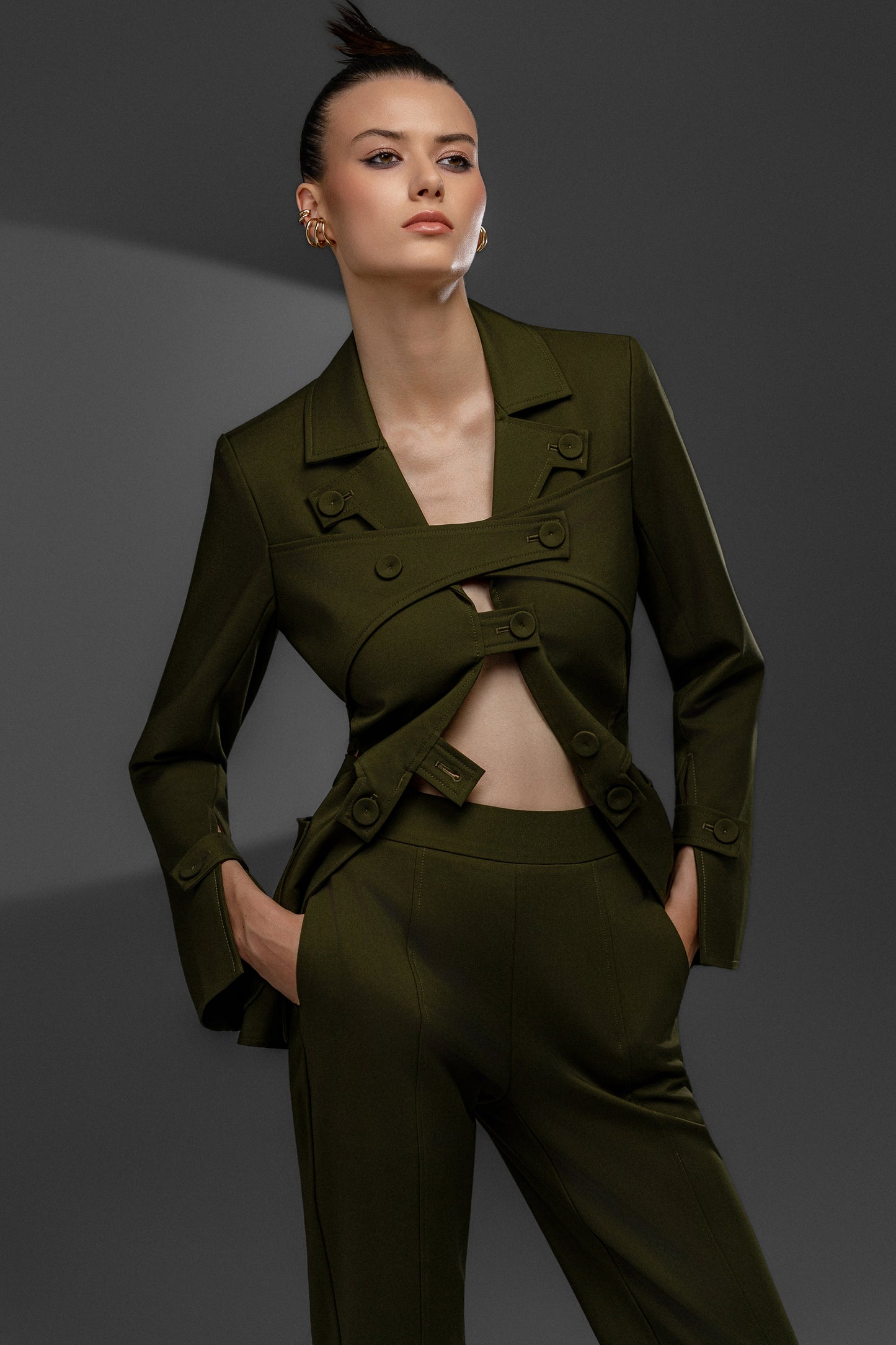 KAEL Military Green deconstructed cutout suit set with sculptural buttoned jacket and waist cutouts