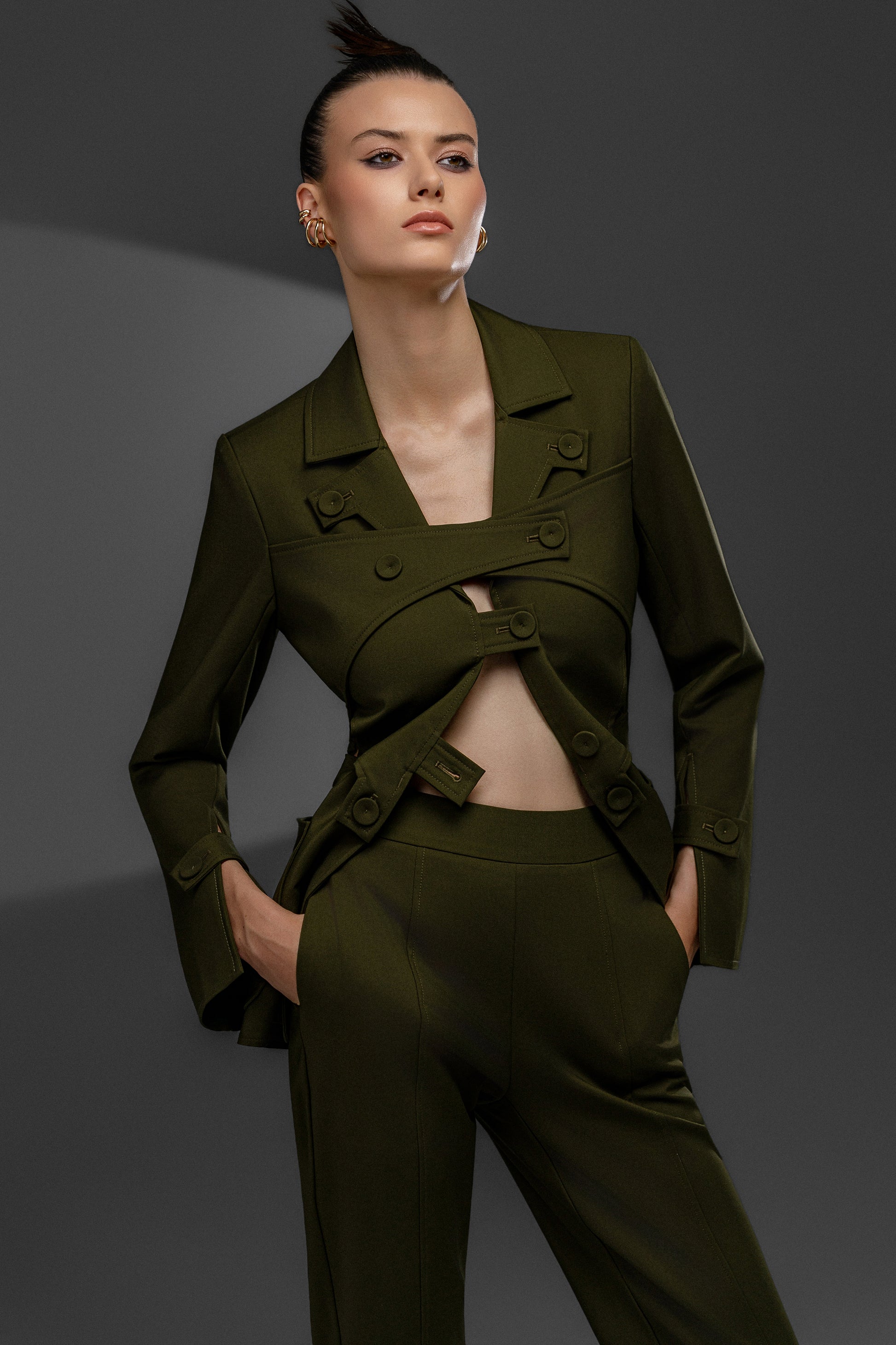 KAEL Military Green deconstructed cutout suit set with sculptural buttoned jacket and waist cutouts