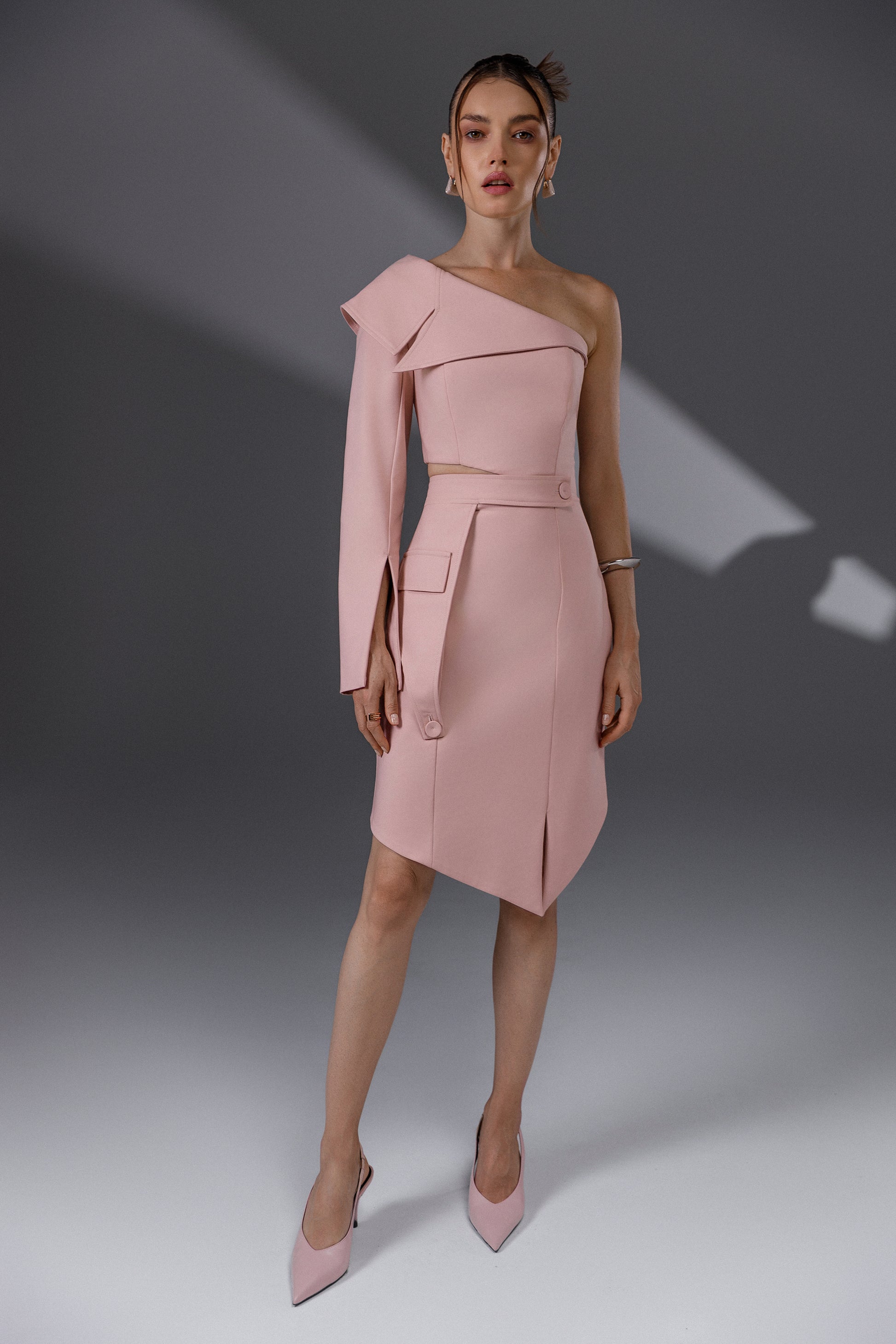 NERIS Lotus Pink asymmetric cutout dress front view with one-shoulder design and asymmetric hem