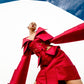 Obsidian Bloom avant-garde editorial outdoor low-angle view featuring sculptural red construction and woven waist cutouts