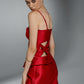 SCORIA red Mikado editorial dress back view with open waist and sculptural lattice detailing by FlyandFall