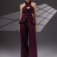 VEYRA Burgundy Crossover Halter Jumpsuit full-length front view with crossover halter neckline, waist cutouts and wide-leg trousers.