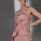 VEYRA Dusty Rose Crossover Halter Jumpsuit bodice detail with crossover neckline, front cutout and fabric-covered buttons.