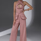 VEYRA Dusty Rose Crossover Halter Jumpsuit full front view with crossover halter neckline, waist cutouts and wide-leg trousers.